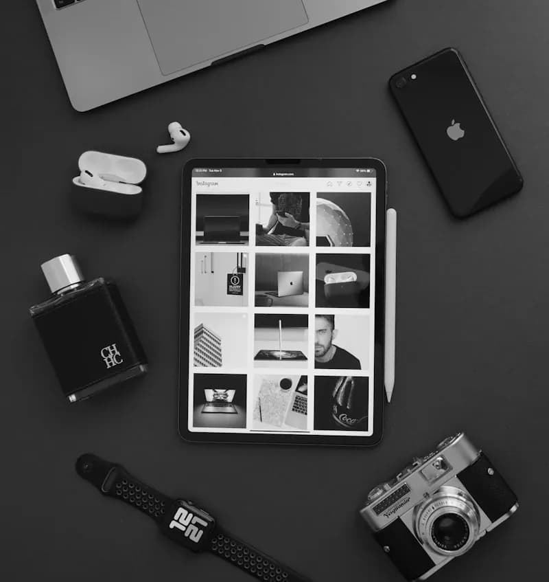 Product photography studio setup with a vintage camera, studio light, and a Coca-Cola bottle prop